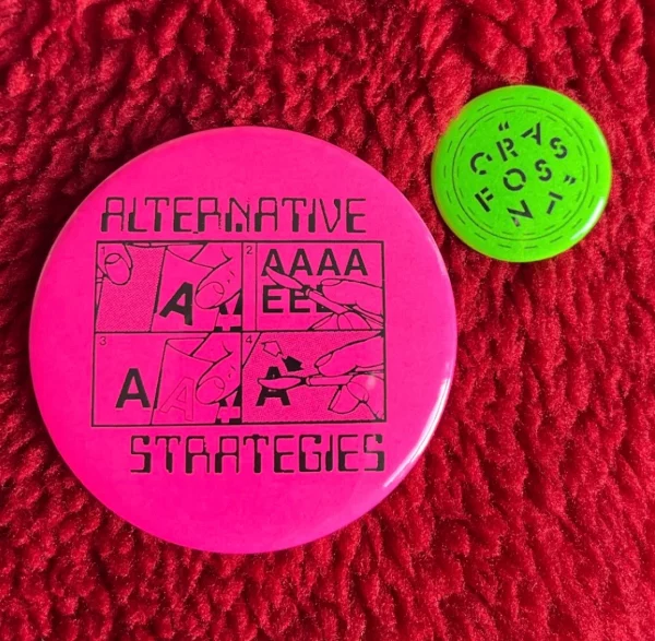 Pink Alternative Strategies badge, green Crass Font badge